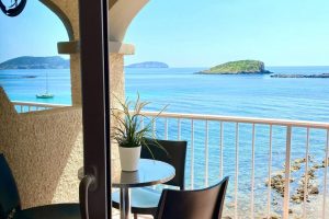 Sea view from a balcony at Zodiac Apartments in Es Canar, Ibiza